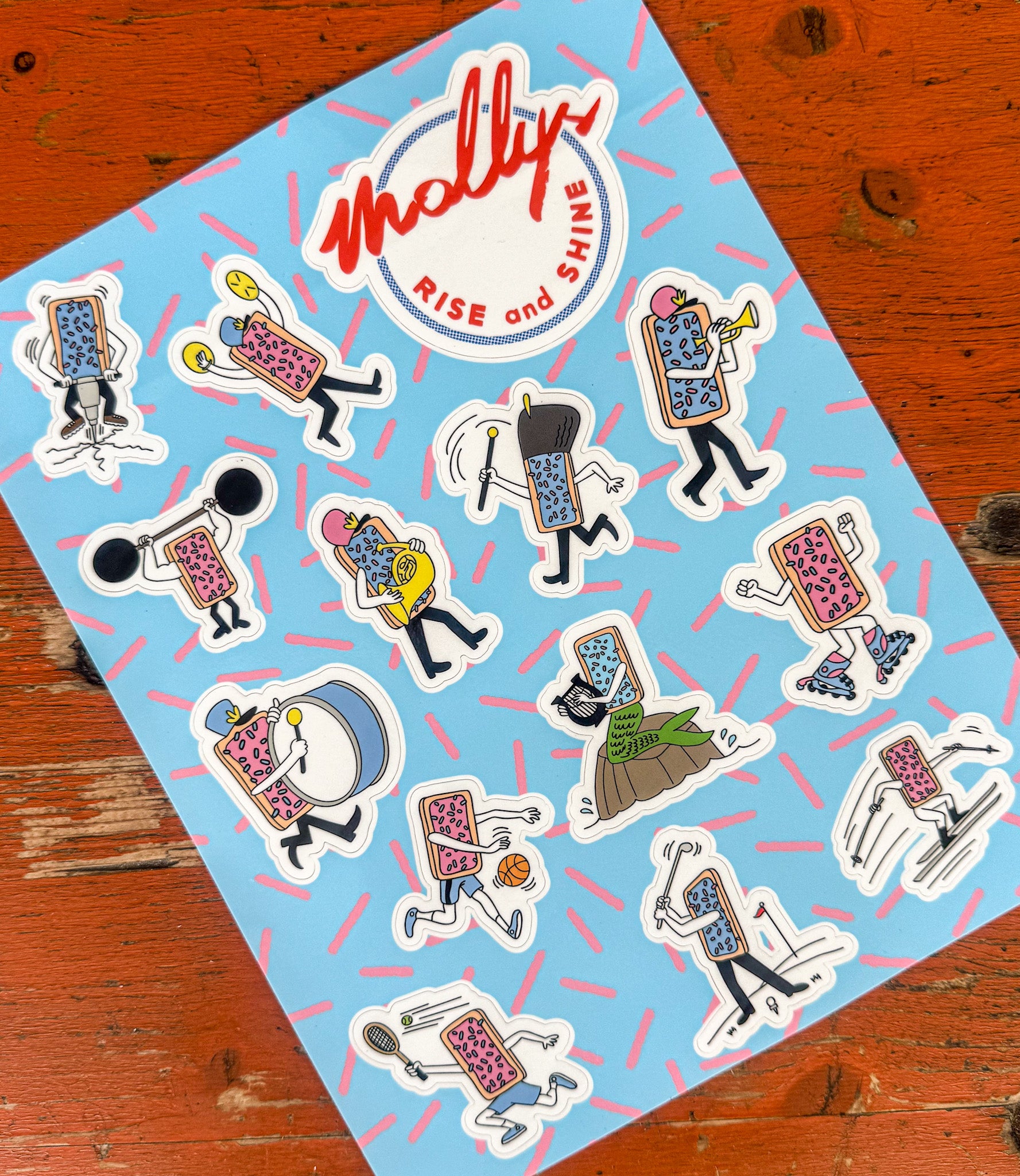 Sheet of stickers with cartoon characters on a blue background with red accents, featuring the brand 'Molly'.s