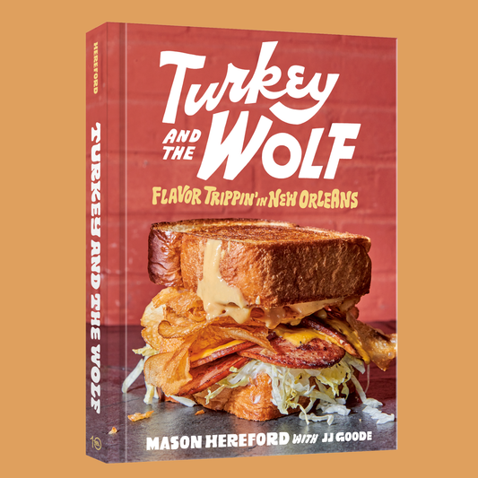 Book cover of 'Turkey and the Wolf' with a sandwich on a red background